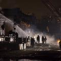 Firefighters putting out fire