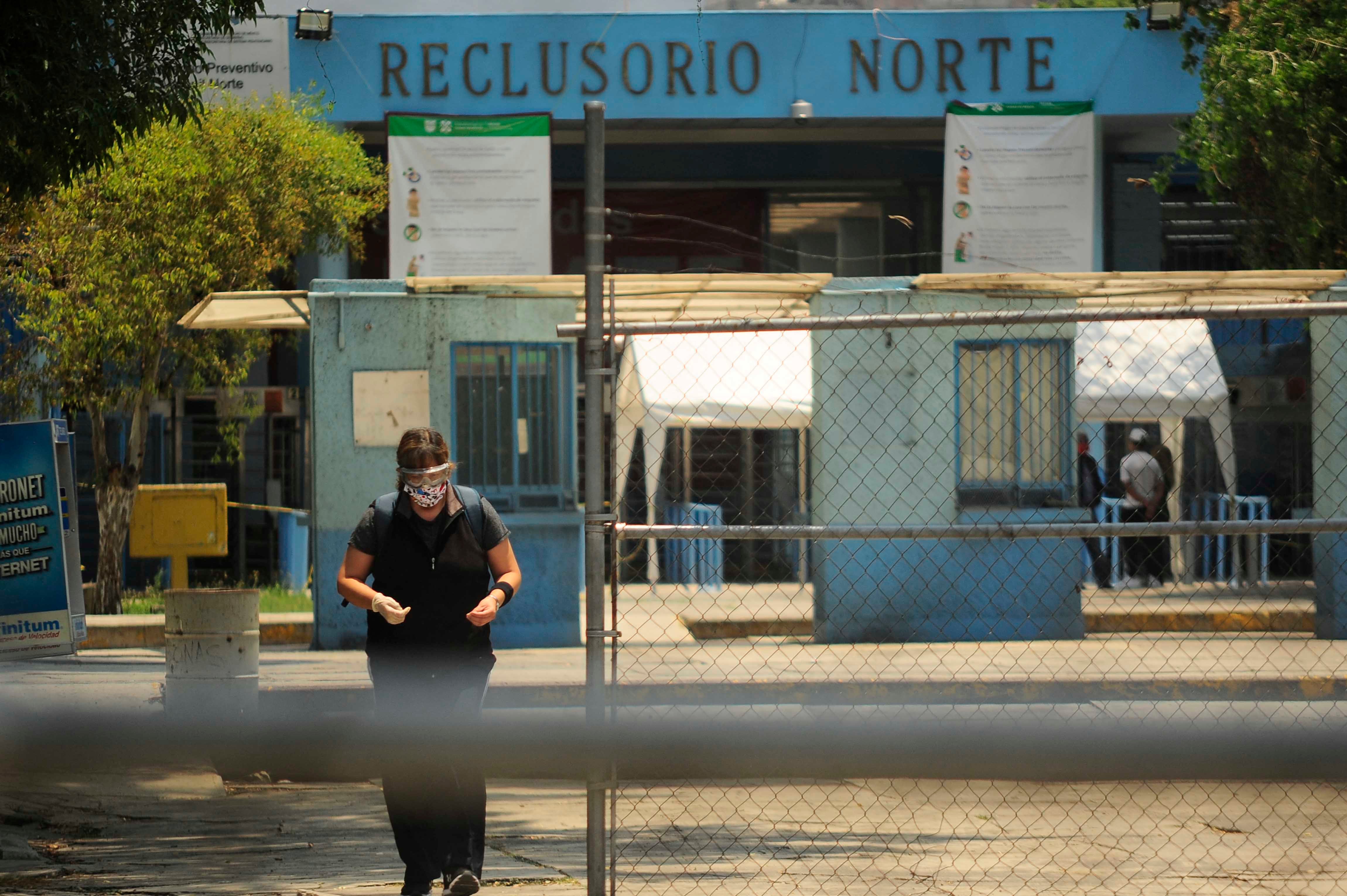  A woman wearing a protective mask leaves North Prison during a demonstration to protest the mistreatment of prisoners during the Covid-19 pandemic on May 13, 2020 in Mexico City, Mexico.