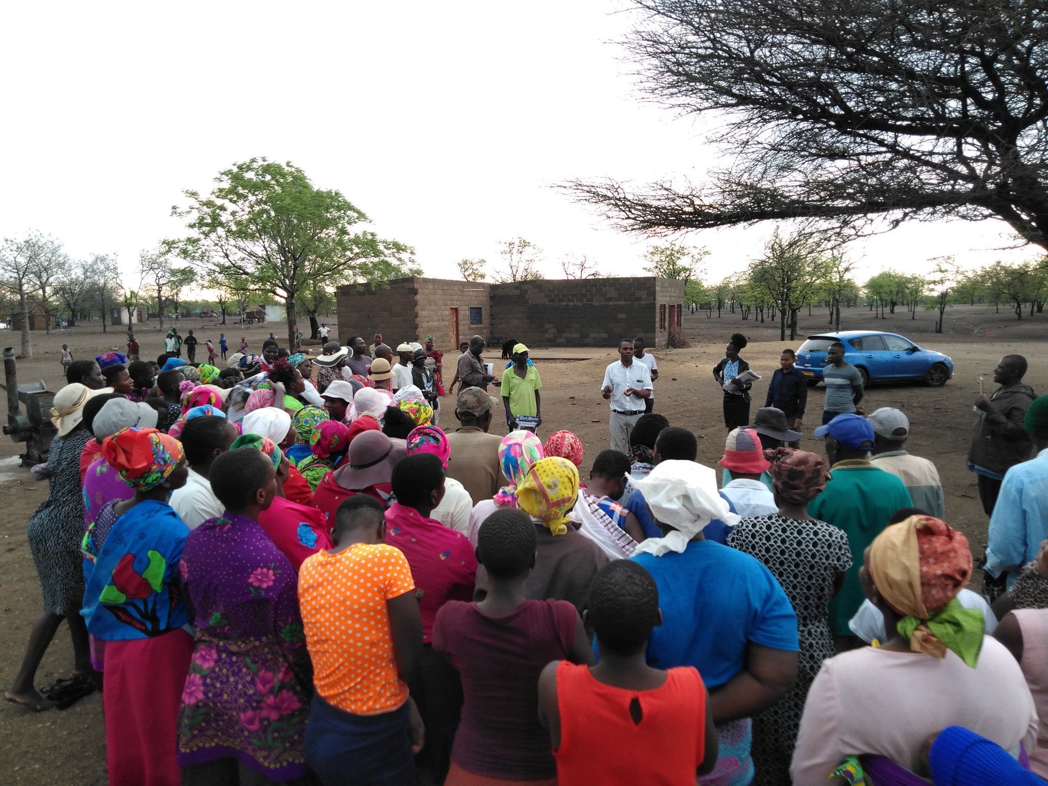 people. gathered. outside. chilonga.