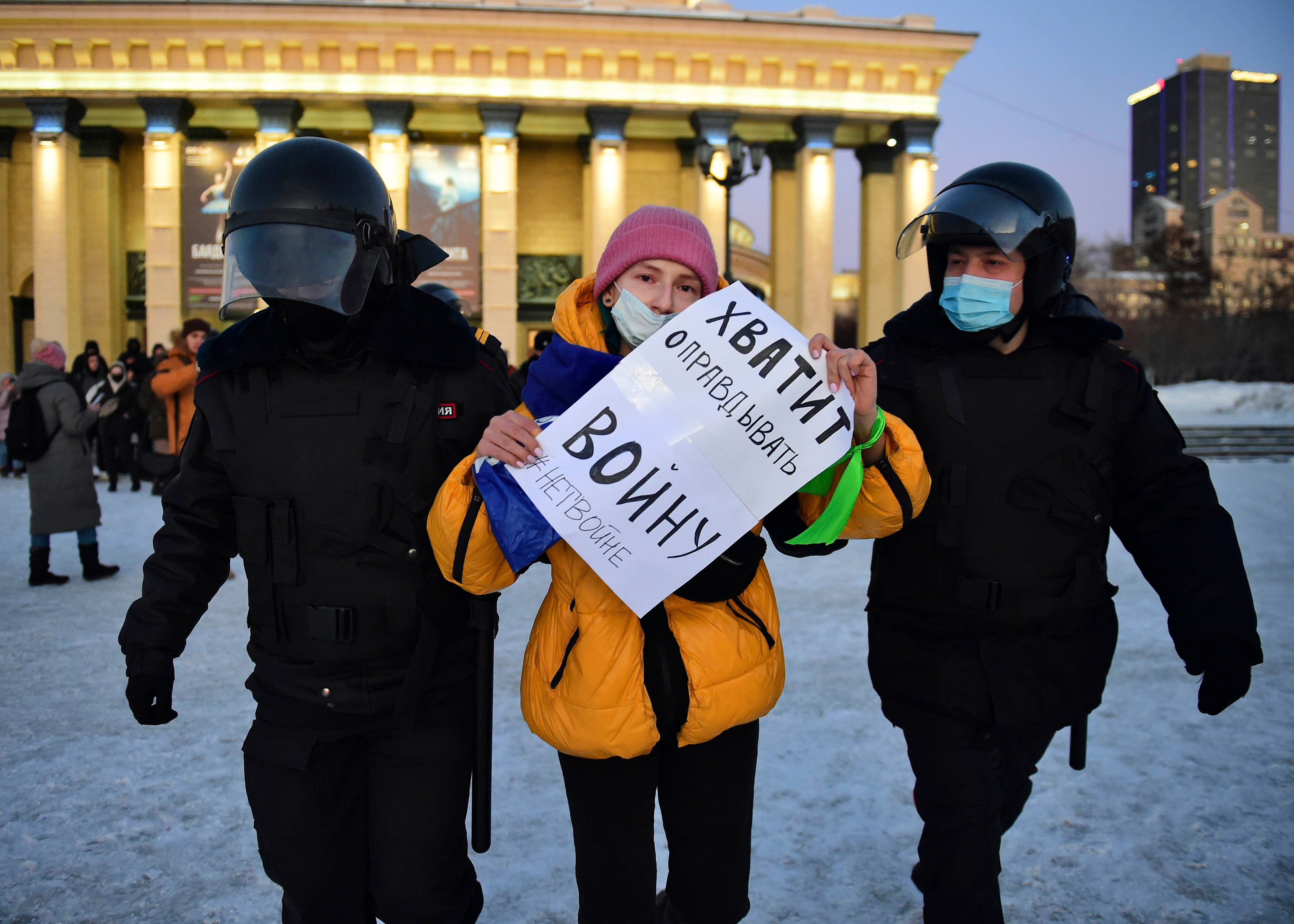 Police detain a demonstrator at a protest against the war in Ukraine, in Lenin Square, Novosibirsk on March 2, 2022.