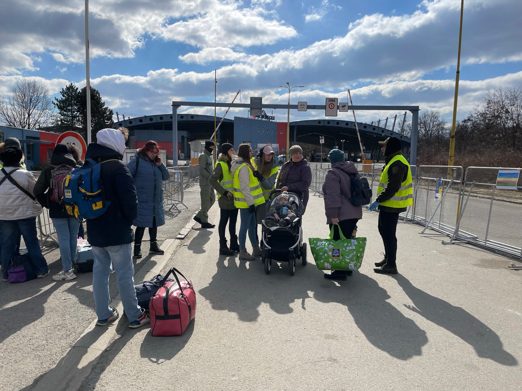 Refugees at the border with officials