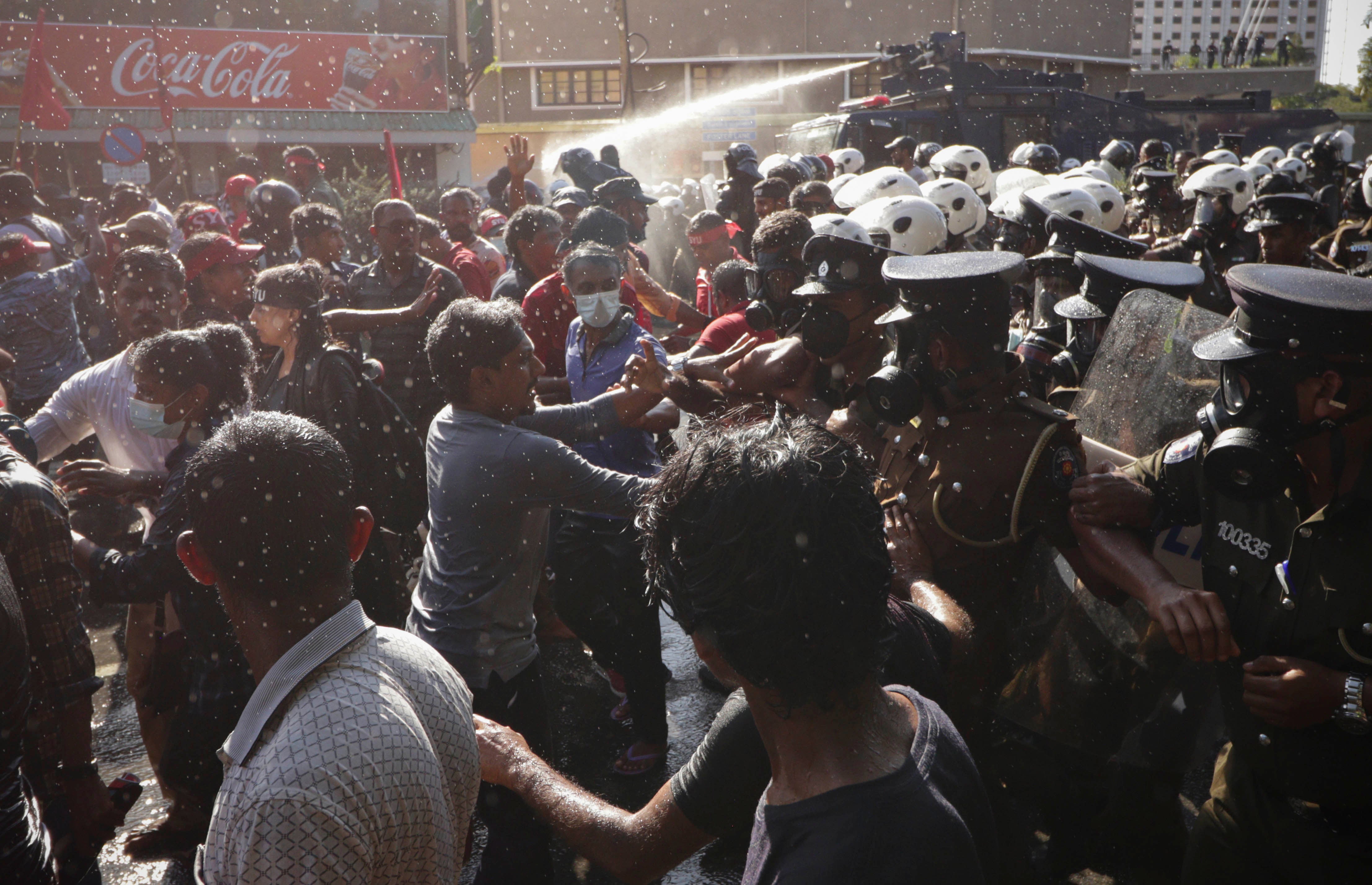 Sri Lankan police disperse protesters in Colombo with tear gas and a water cannon, September 24, 2022.