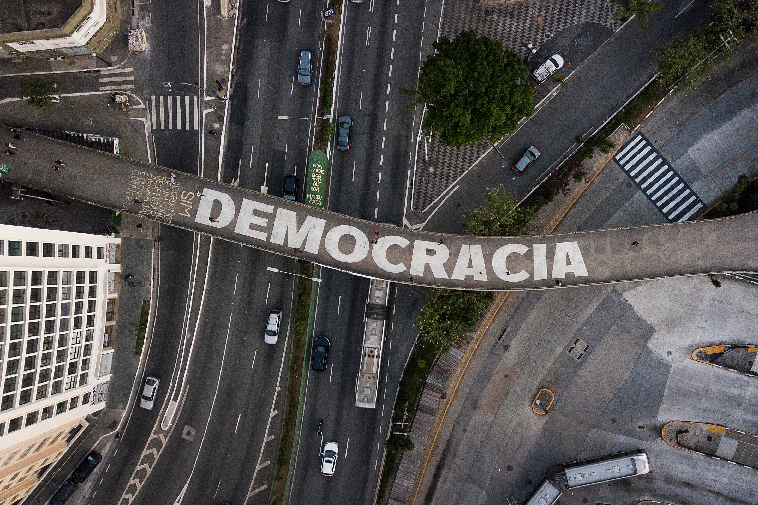 The word “democracy” on a pedestrian bridge in São Paulo, Brazil, October 26, 2022.