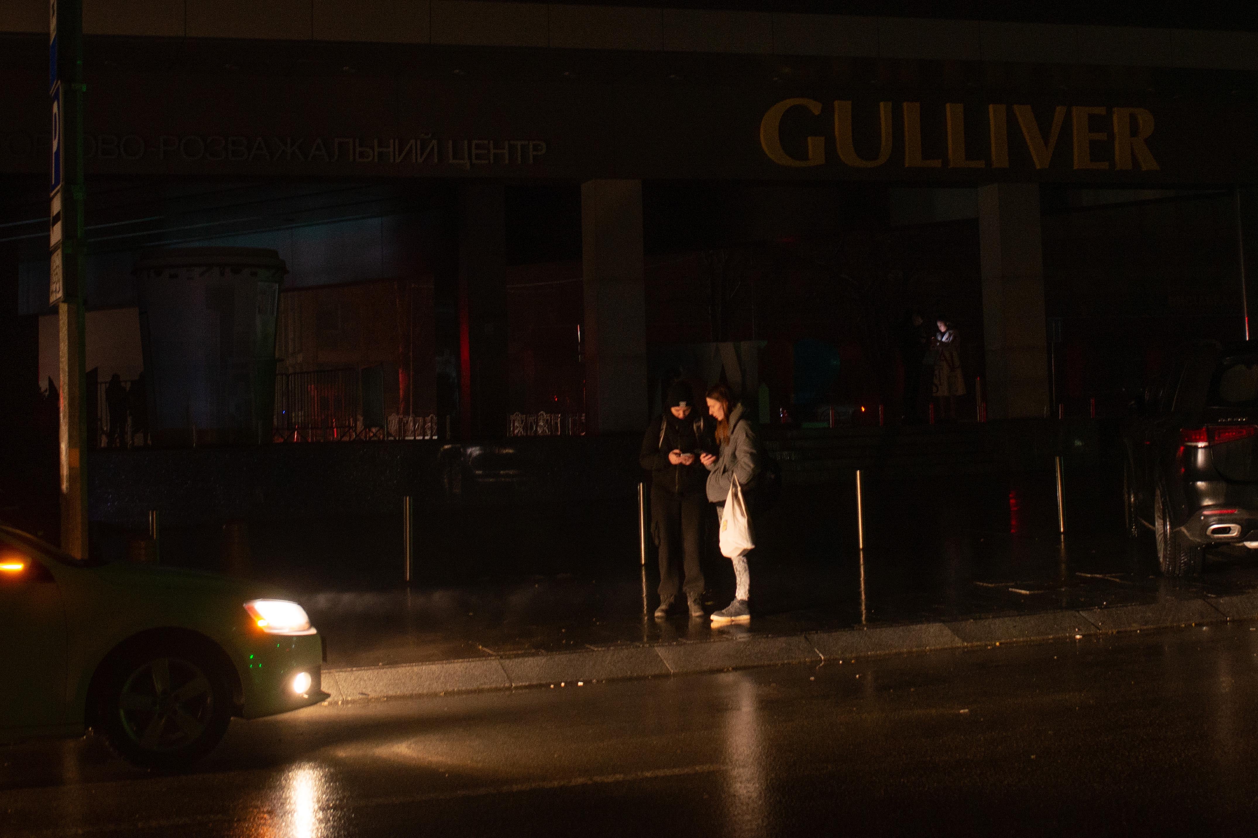 People waiting for taxi in central Kyiv on November 24. Russia’s attacks on Ukraine’s energy grid on November 23, 2022 killed or injured over 30 civilians and interrupted access to power for millions throughout Ukraine. 