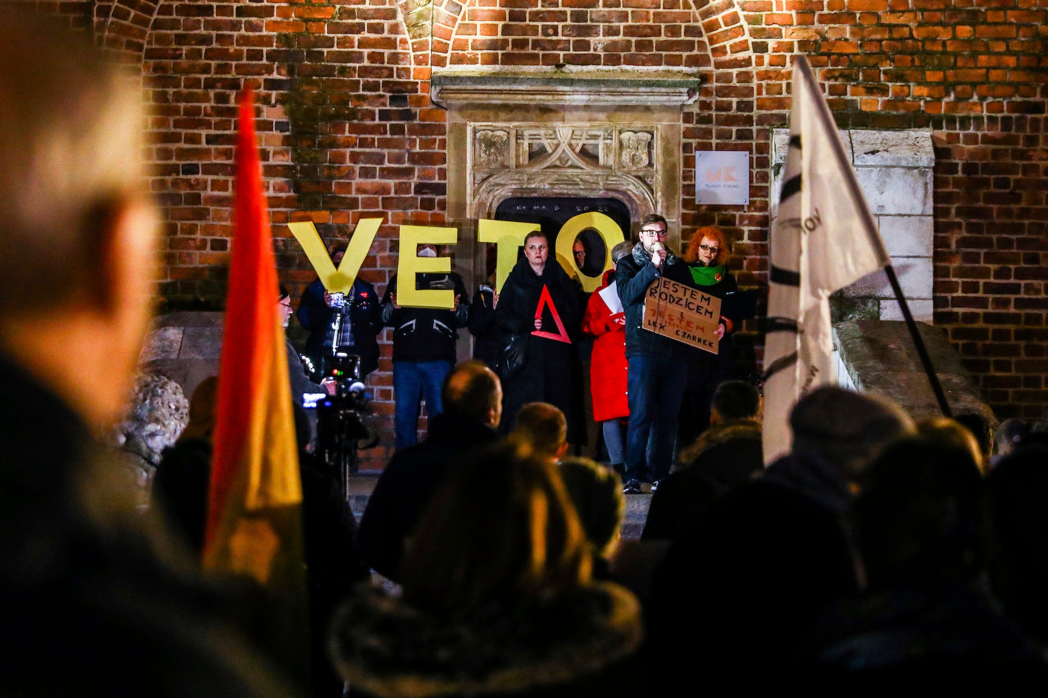 People attend a “Stop Lex Czarnek” protest at the Main Square in Krakow, Poland. 