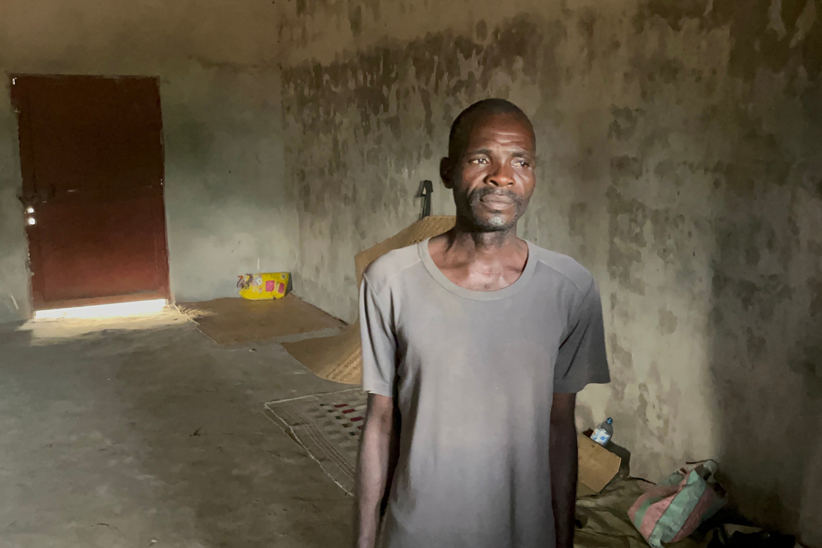 Portrait of a man in an empty room 