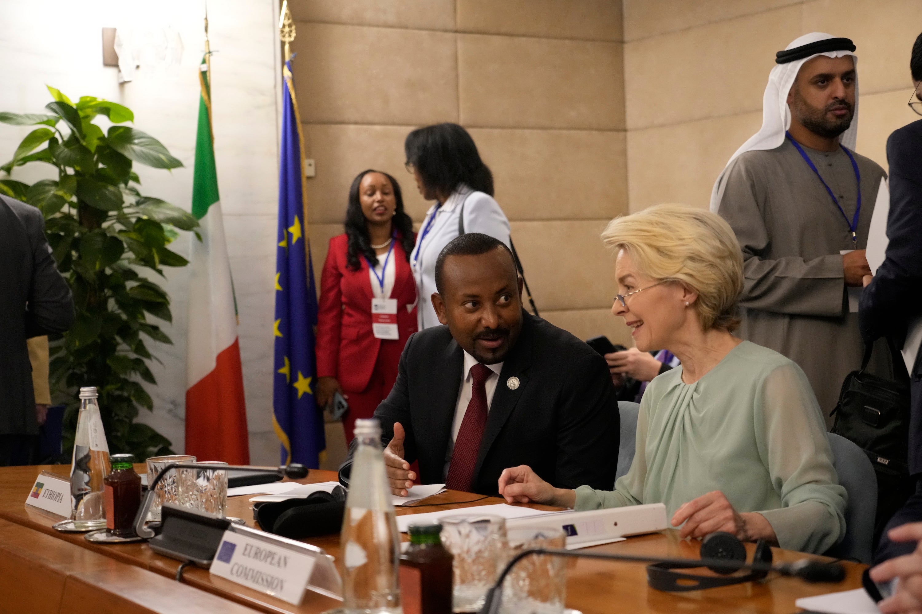 European Commission President Ursula von der Leyen, right, talks with Ethiopian Prime Minister Abiy Ahmed Ali during an international conference on migration in Rome, July 23, 2023.