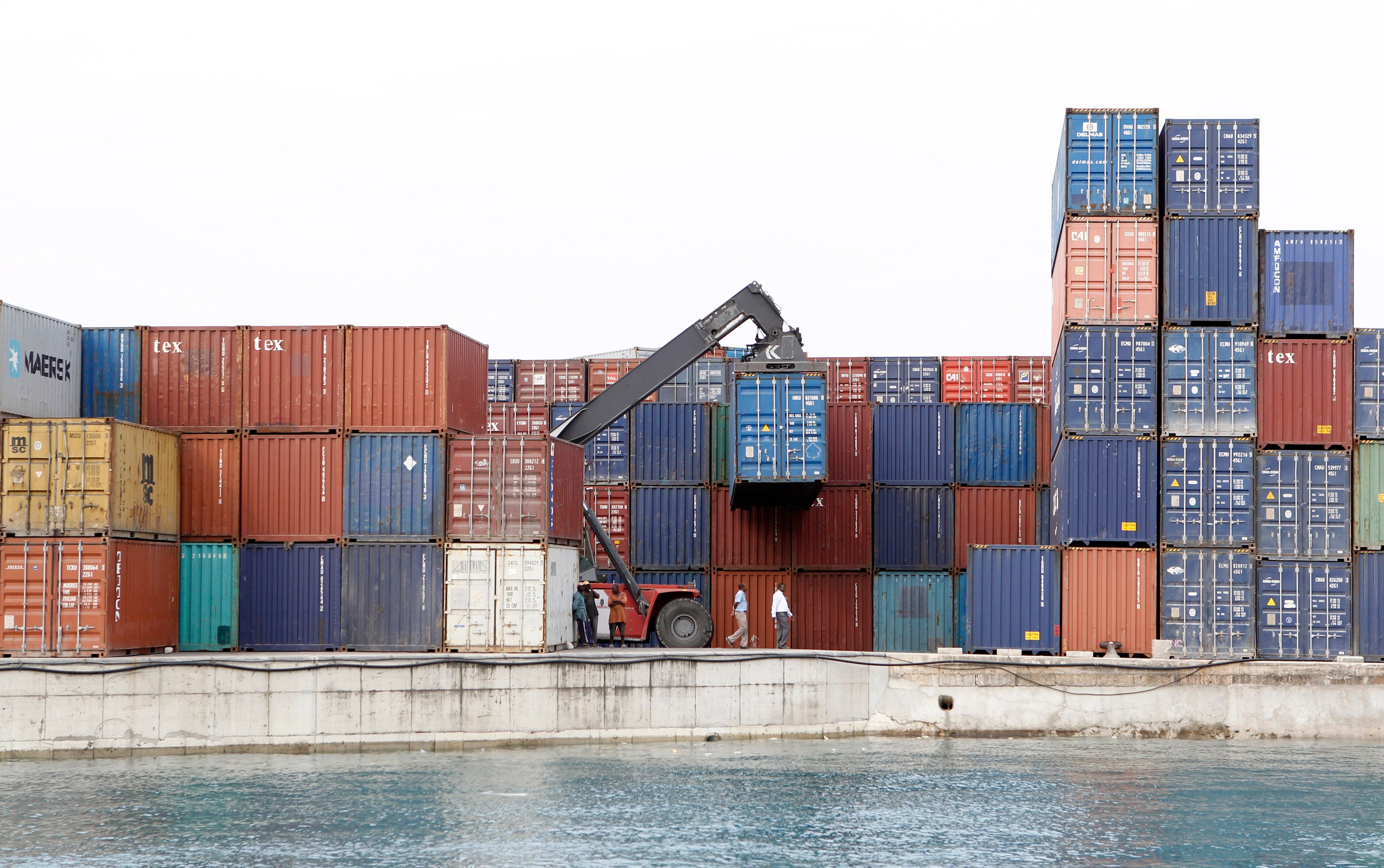 A crane arranges containers at the Port of Zanzibar, Tanzania, July 19, 2012.