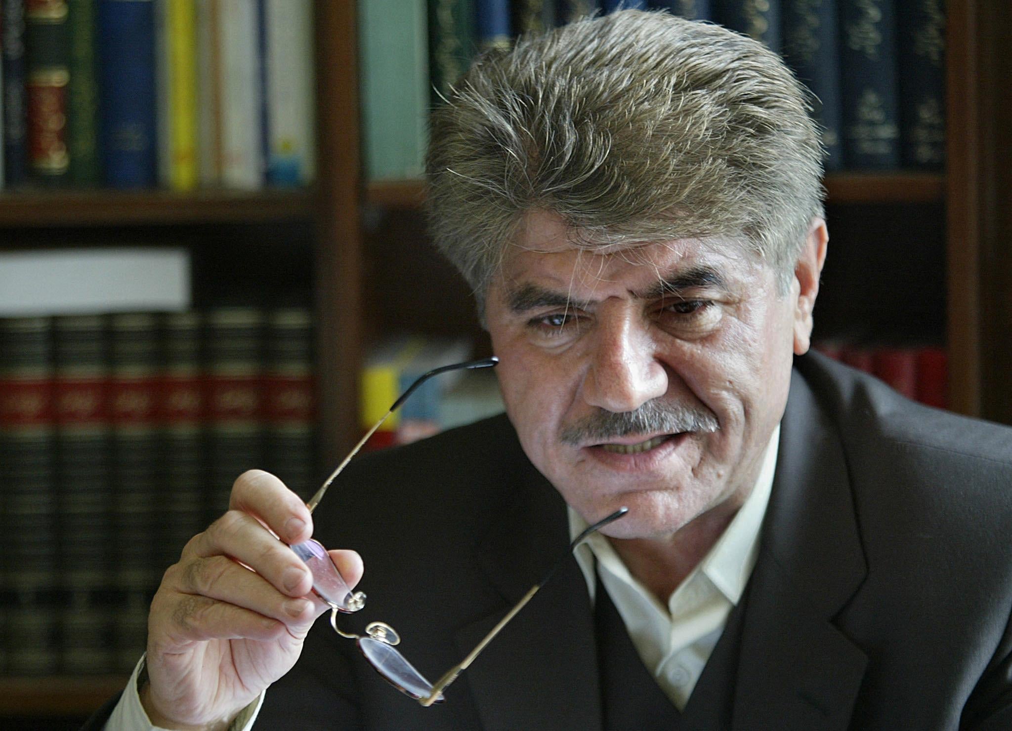 Iranian lawyer Saleh Nikbakht at his office in Tehran, May 4, 2004. 
