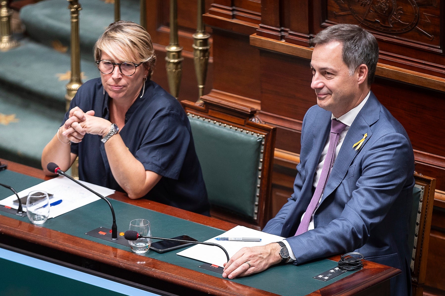 Minister for Development Cooperation and Metropolitan Policy Caroline Gennez and Prime Minister Alexander De Croo during a plenary session of the Chamber at the Federal Parliament in Brussels, October 19, 2023. 