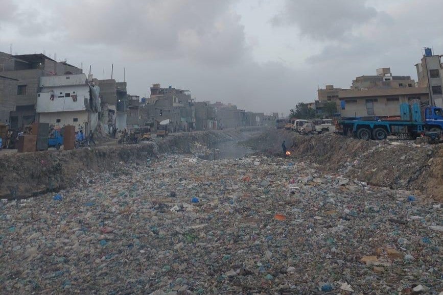 A section of a stormwater channel in Karachi clogged with solid waste