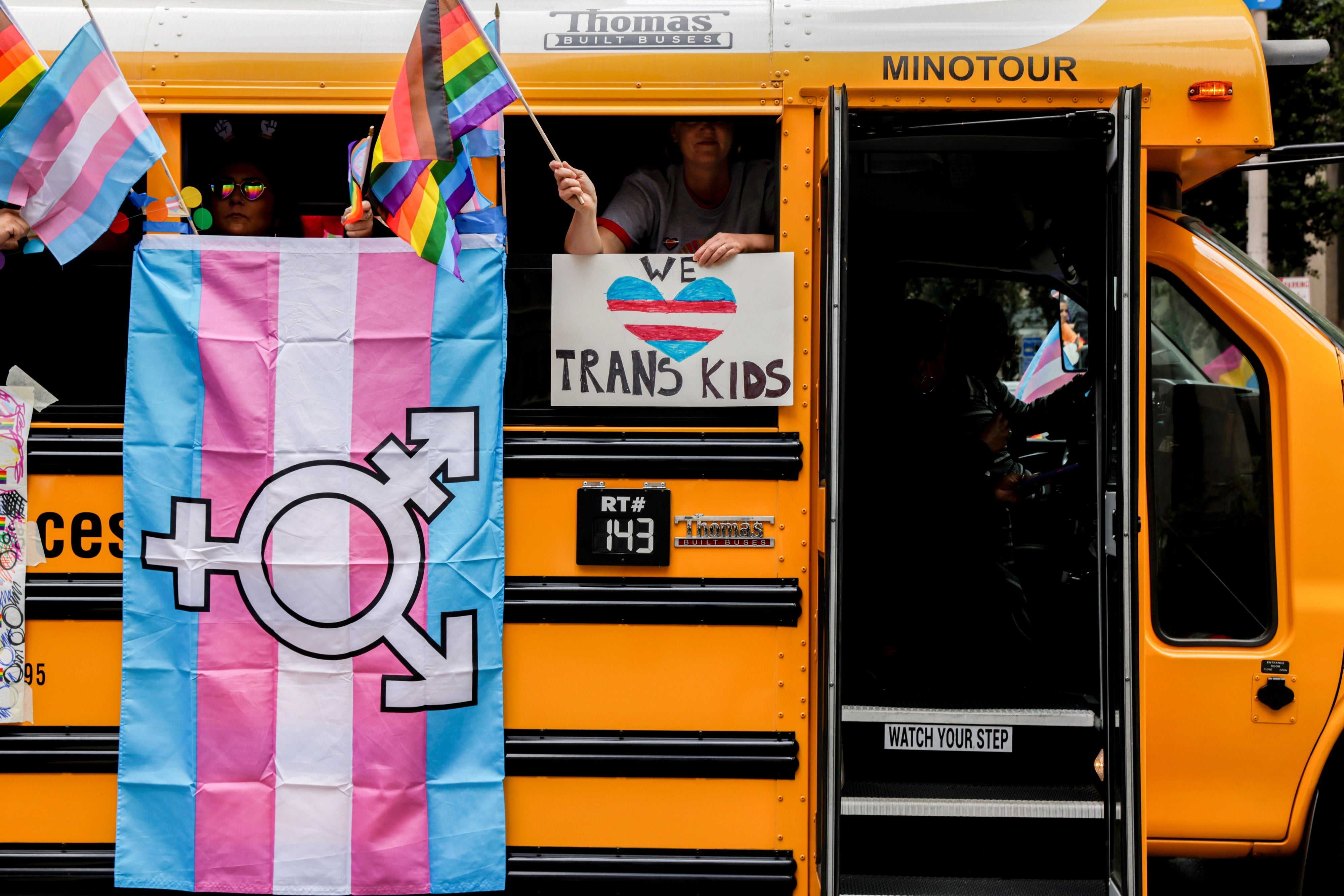 A school bus makes its way down Market Street during the San Francisco Pride Parade on Sunday, June 25, 2023. 