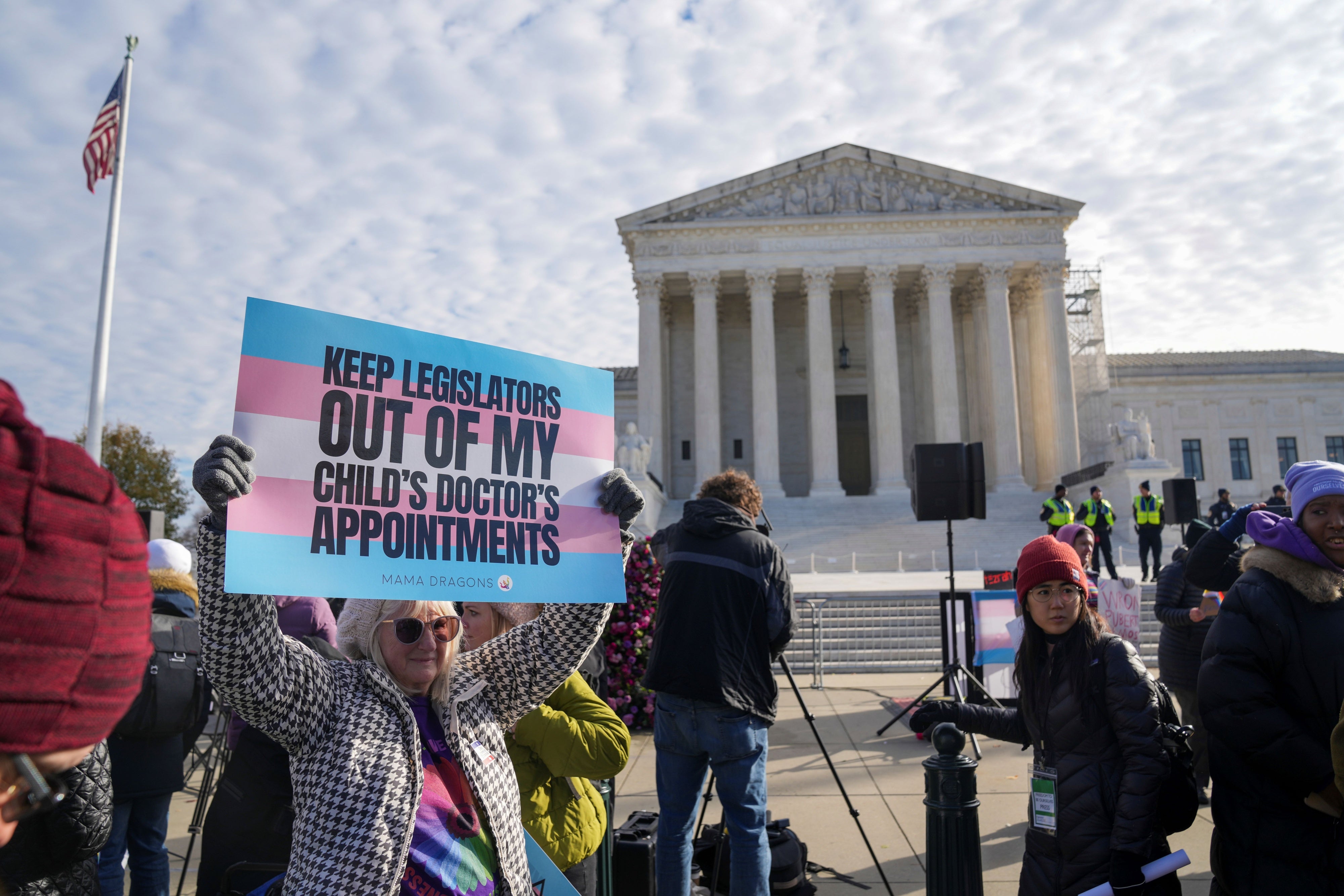 Supporters of gender-affirming care protest outside the Supreme Court in Washington, DC, on December 4, 2024. (c) 2024 Photo by Andrew Leyden/NurPhoto via AP