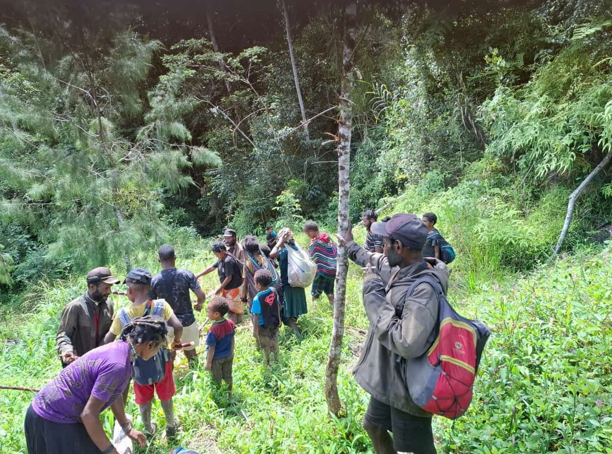 Villagers fleeing fighting between the Indonesian military and the West Papuan militants to Sugapa, the capital of Intan Jaya regency.