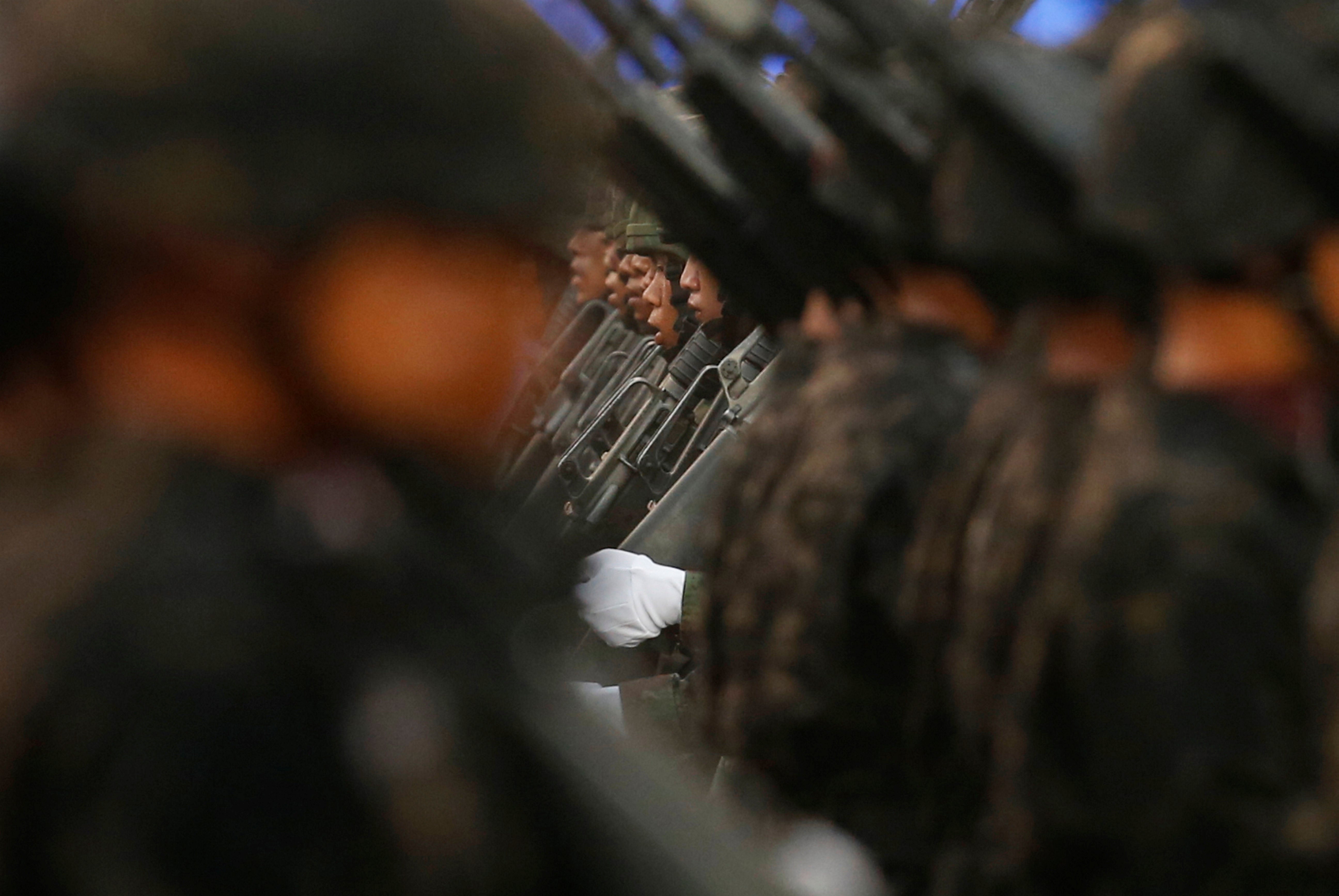 Soldiers march during the annual Military Parade in Saraburi province, Thailand, January 18, 2020.