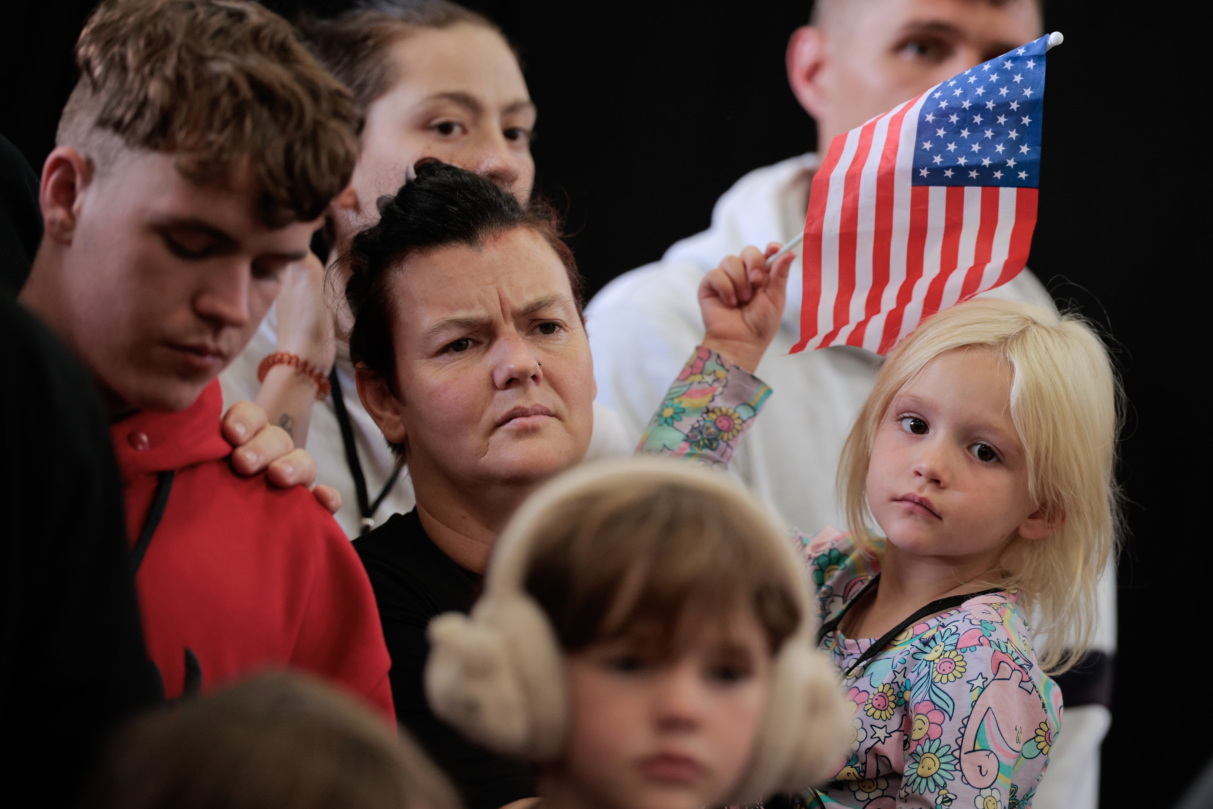 Some of the dozens of white South Africans who accepted an invitation from the Trump administration to come to the United States as refugees arrived at an air hangar near Washington Dulles International Airport in Virginia on May 12, 2025.
