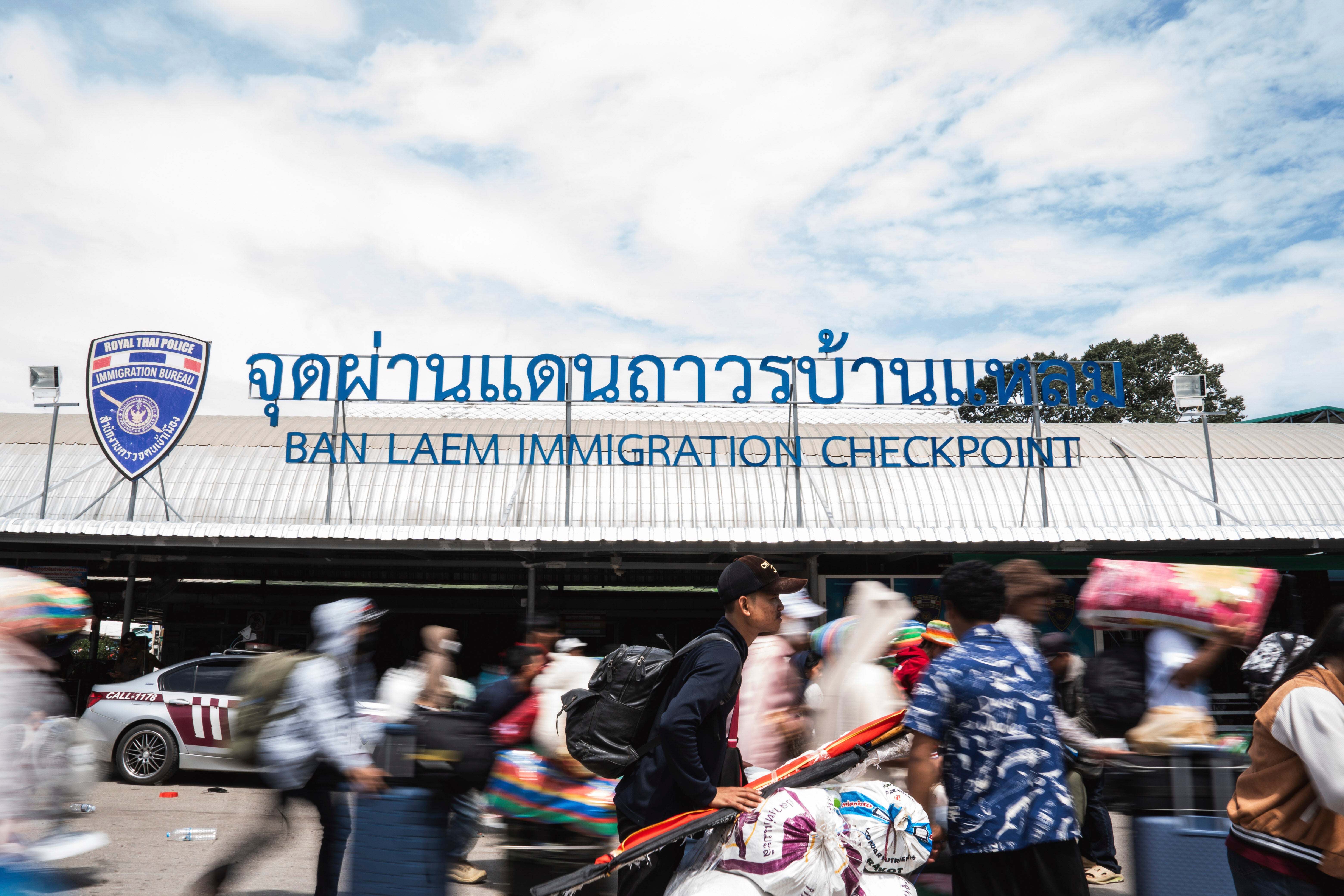 Migrant workers move through the Ban Laem Immigration Checkpoint on the Thai-Cambodian border, July 28, 2025.