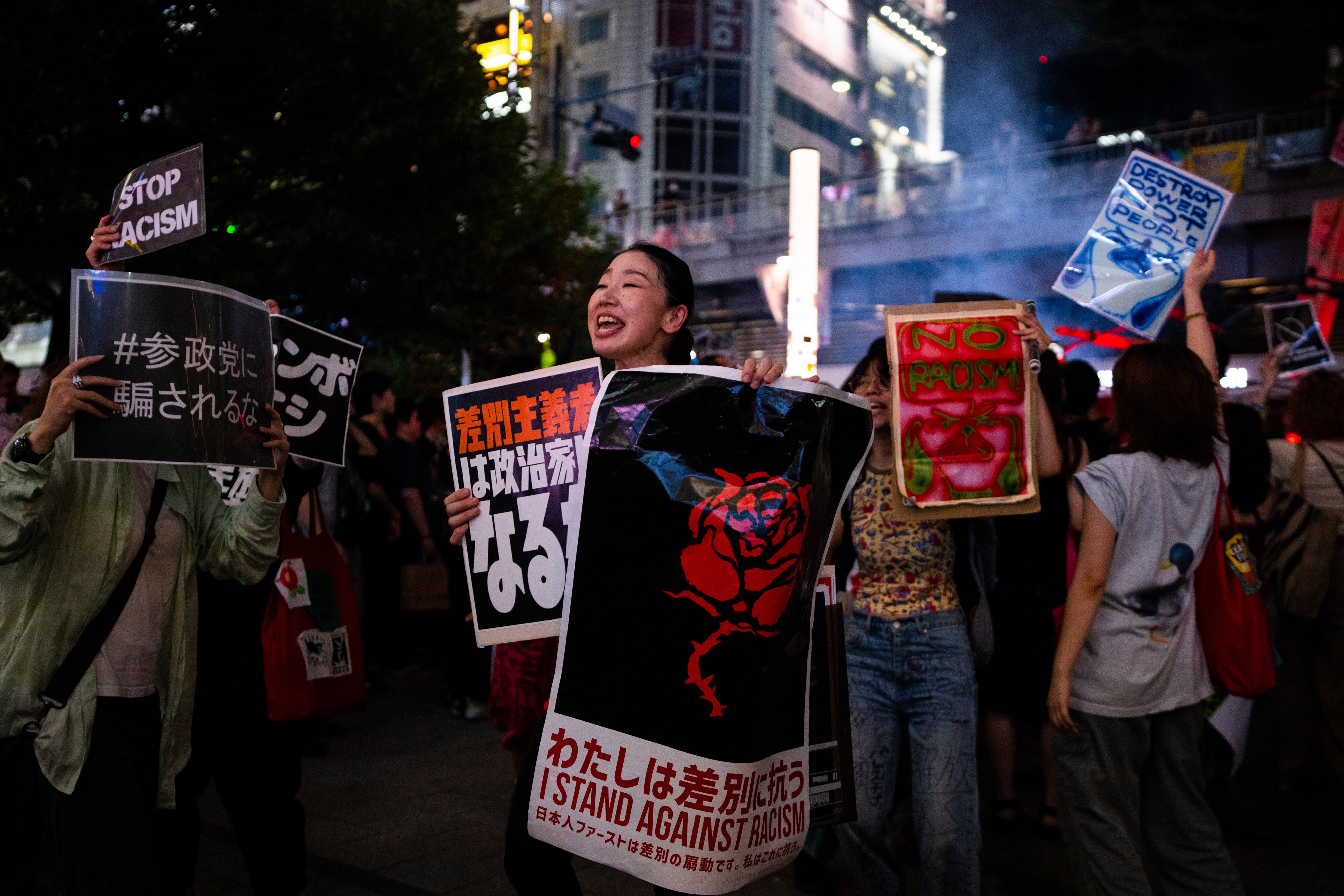 Demonstrators take part in a “protest rave” against racism ahead of the upper house election, in Tokyo, Japan, on July 13, 2025. 