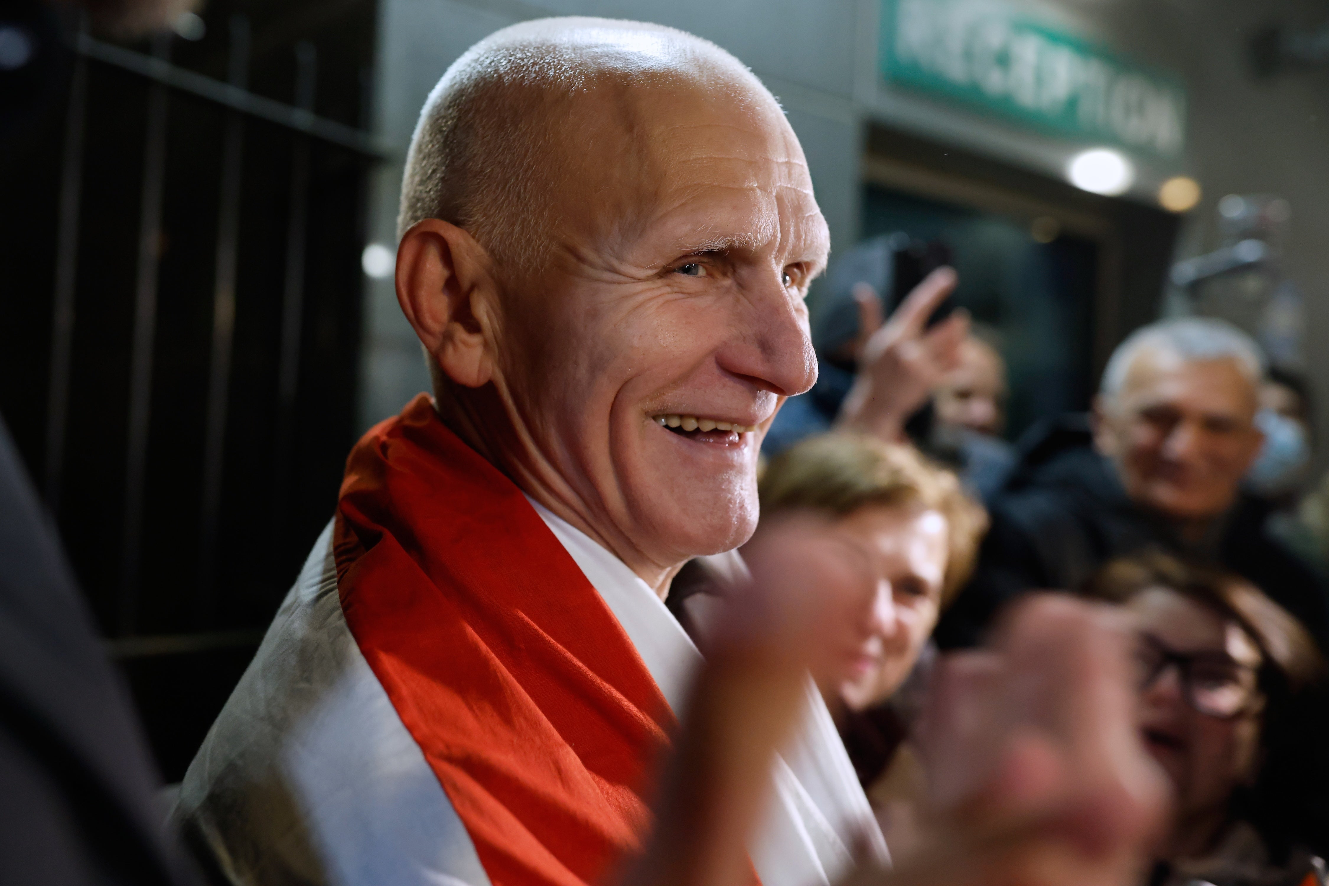 Nobel Peace Prize laureate Ales Bialiatski, one of released Belarusian prisoners, smiles as he arrives at the U.S. Embassy in Vilnius, Lithuania, on December 13, 2025.