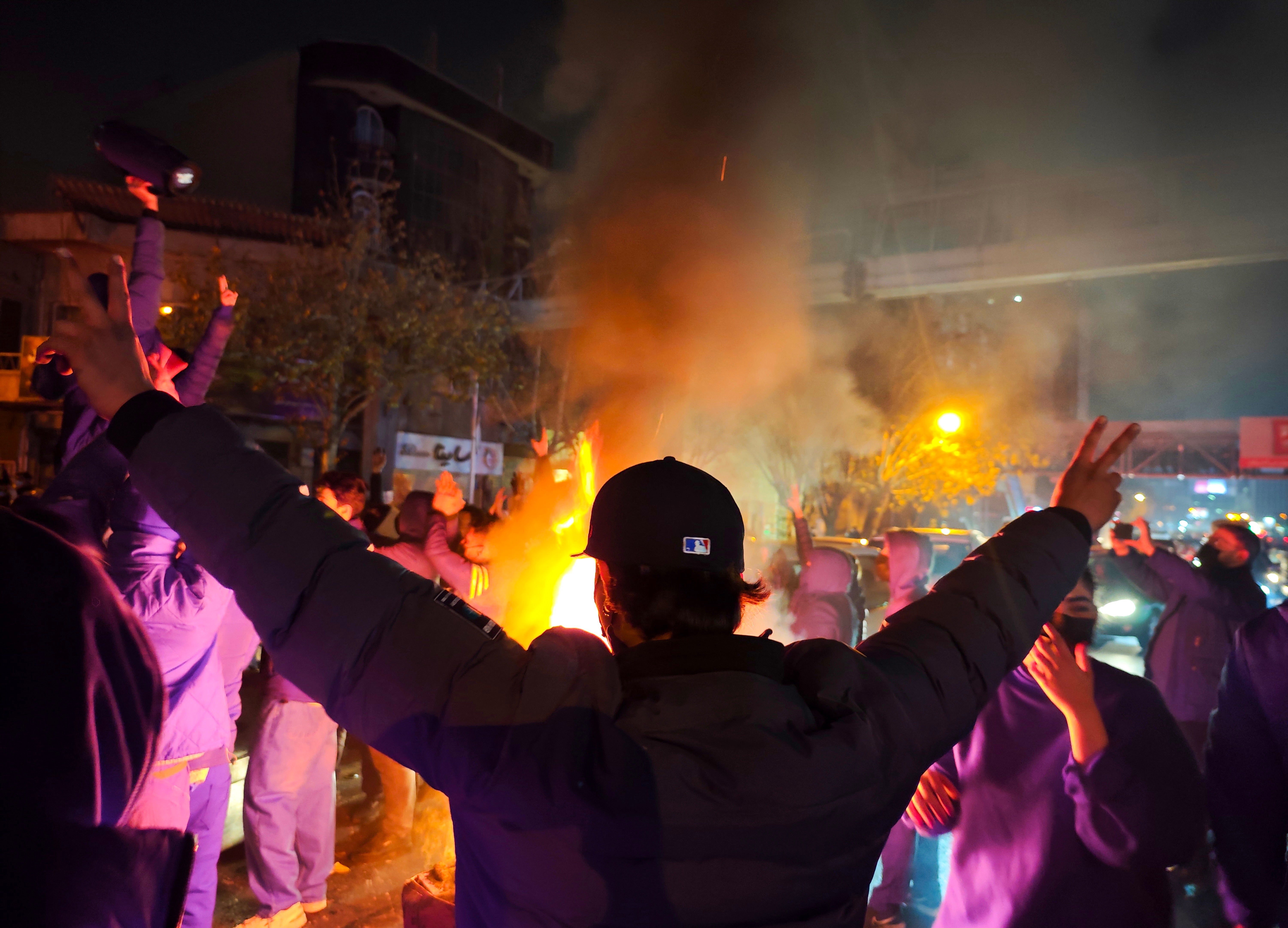 Fires are lit as protesters demonstrate in Tehran, Iran, on January 8, 2026. 