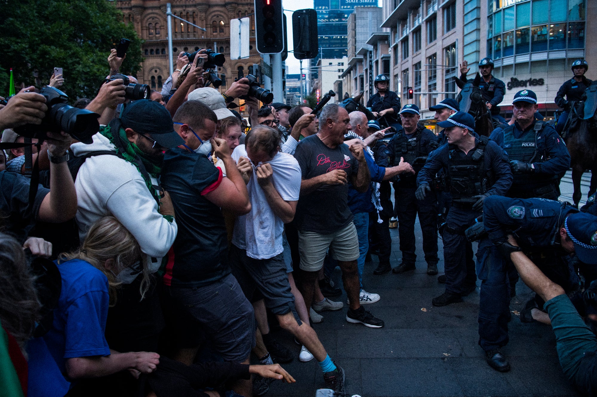 Police confronting a group of protesters
