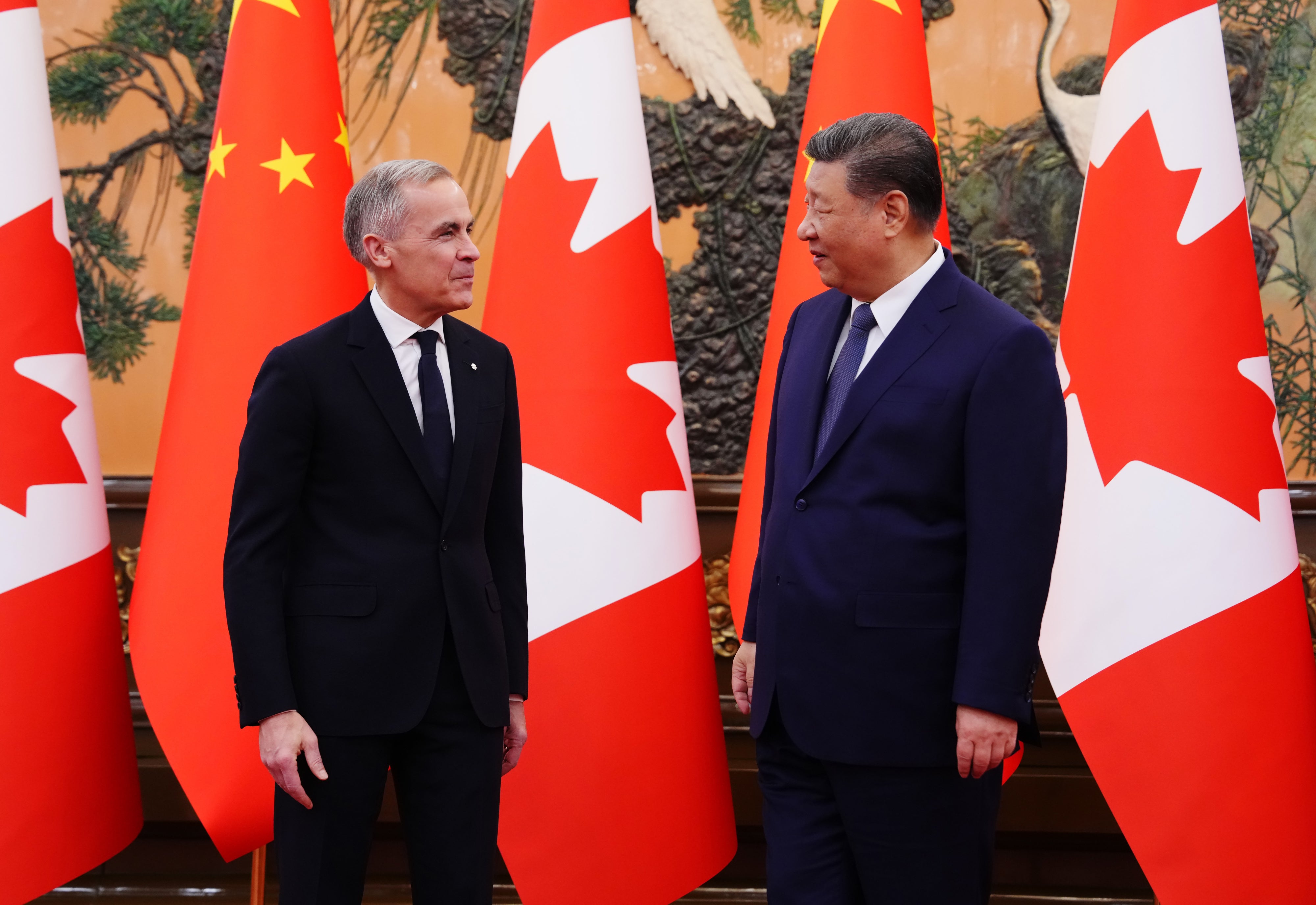 Canadian Prime Minister Mark Carney, left, meets with Chinese President Xi Jinping