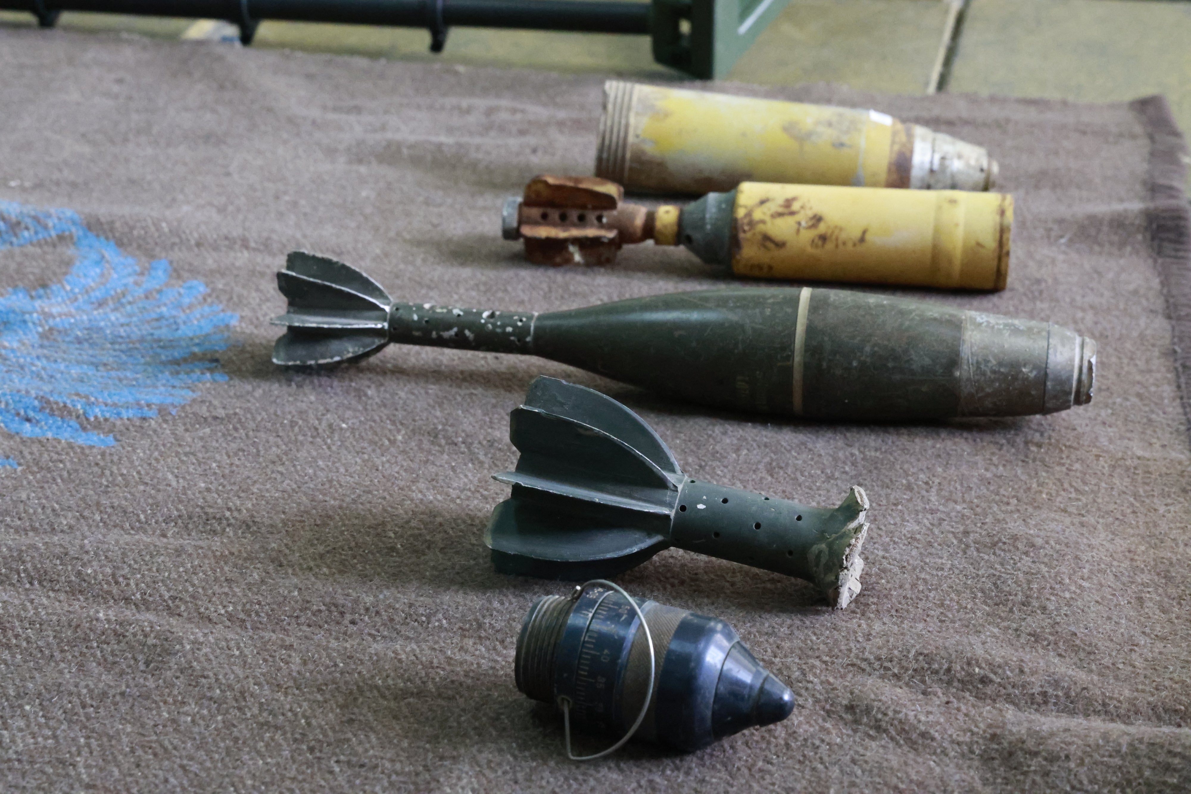 Ammunition set out for a mine-risk education event to raise students’ awareness about the threat of landmines and unexploded ordnance from past conflicts, in Shebaa, Lebanon, January 21, 2026. 