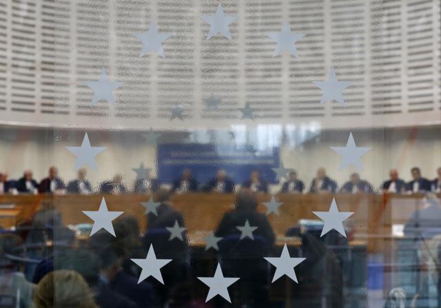 Judges of the European Court of Human Rights sit in the courtroom during a hearing at the European Court of Human Rights in Strasbourg, France.