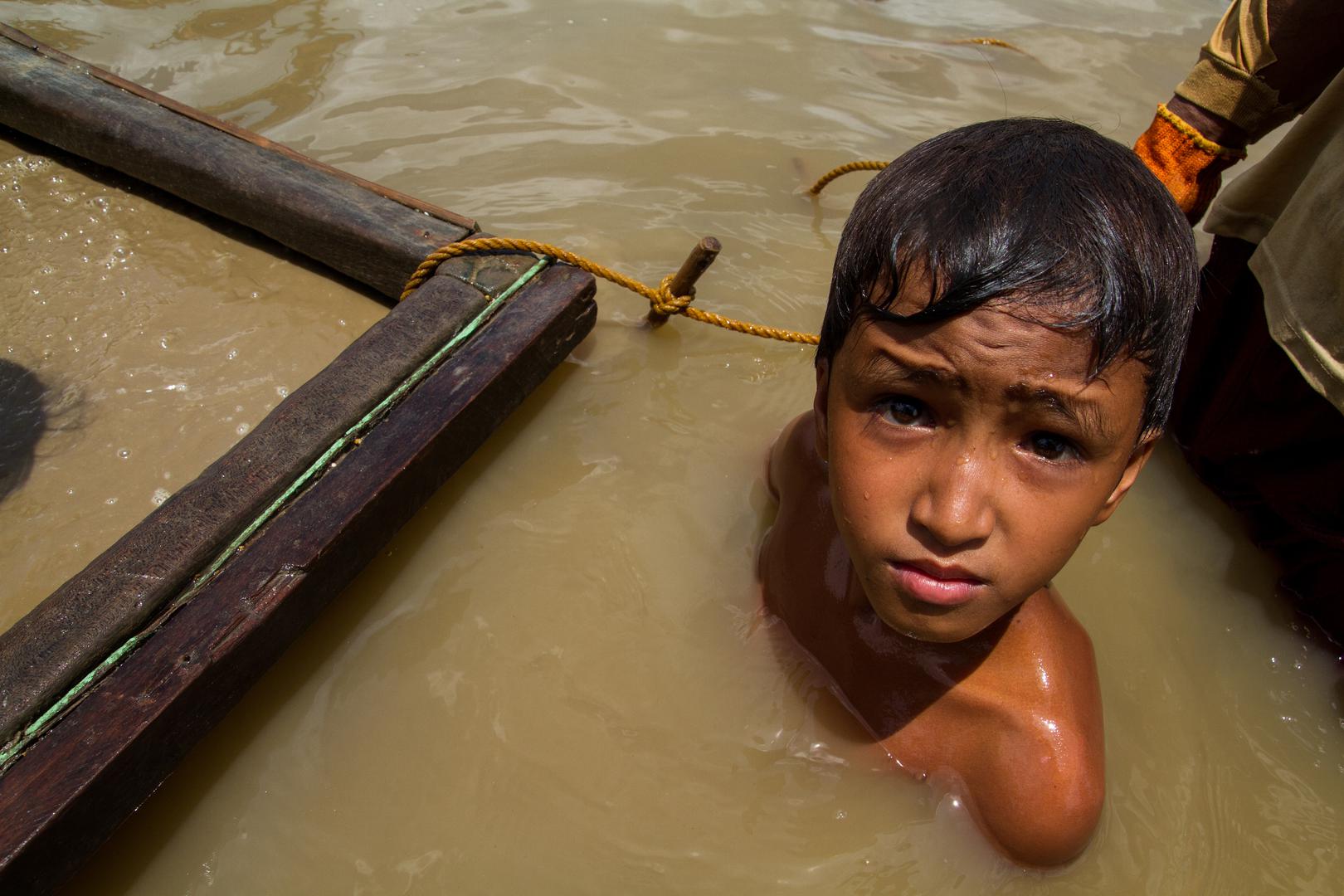 boy works at an underwater mining site