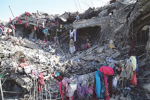rubble of shops near Religious Endowments Ministry