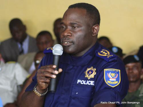 John Numbi, a former national police inspector.