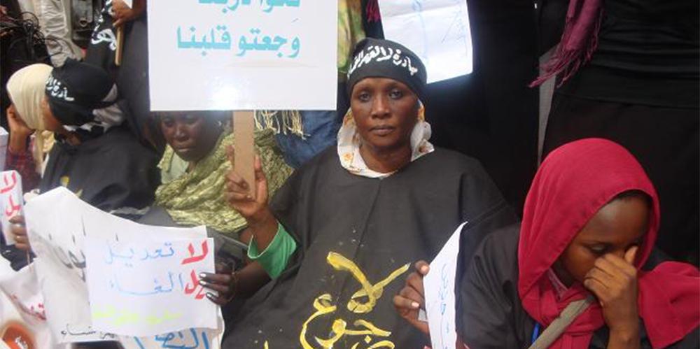 Women at a "No to Women's Oppression" rally protesting Sudan's public order laws, in solidarity with journalist Lubna Hussein, who was prosecuted for wearing trousers.  © August 2009 Private