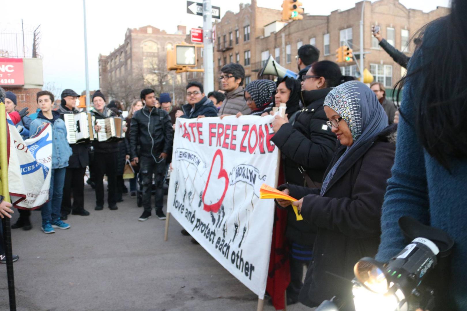 People gather for a press conference and march to launch a community defense and “Hate-Free Zone” in Brooklyn, New York, January 25, 2017. Kazi Fouzia, a community organizer at DRUM, reading a handout at a rally organized by DRUM in Brooklyn