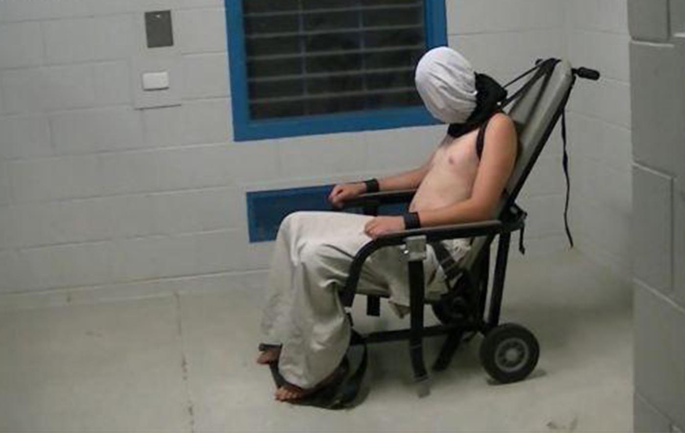 A still from the Australian Broadcasting Company’s program “Four Corners,” showing 17-year-old Dylan Voller strapped into a mechanical restraint chair on March 2015 in the Northern Territory.