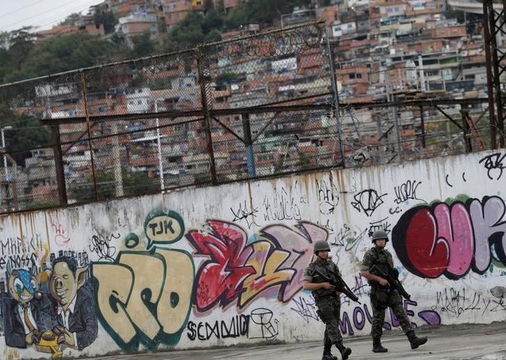 Brazilian Army soldiers patrol outside Maracana Stadium during a rehearsal of the 2016 Rio Olympics opening ceremony in Rio de Janeiro, Brazil, July 17, 2016. 