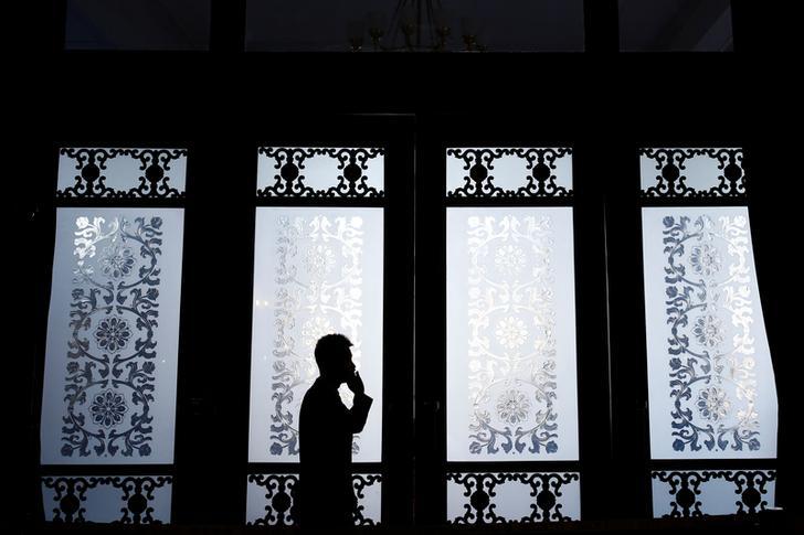 A man talks on the phone in Beijing, China, March 2, 2017.