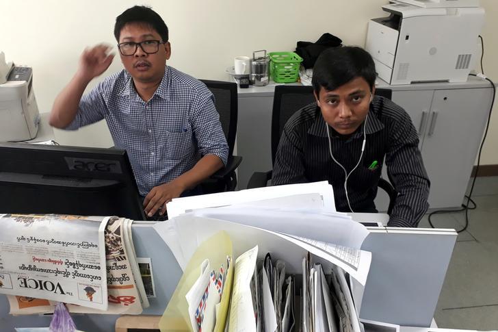 201712asia_burma_reuters Reuters journalists Wa Lone (L) and Kyaw Soe Oo, who are based in Burma, pose for a picture at the Reuters office in Rangoon, Burma on December 11, 2017.