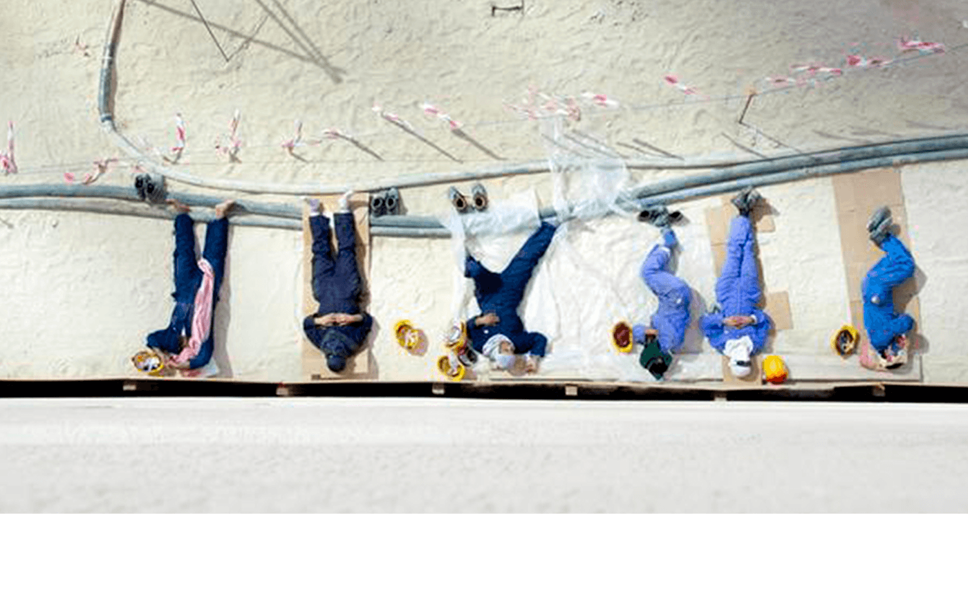 Foreign workers take a break during lunch at a building site in Kuwait City, October 21,2013. 
