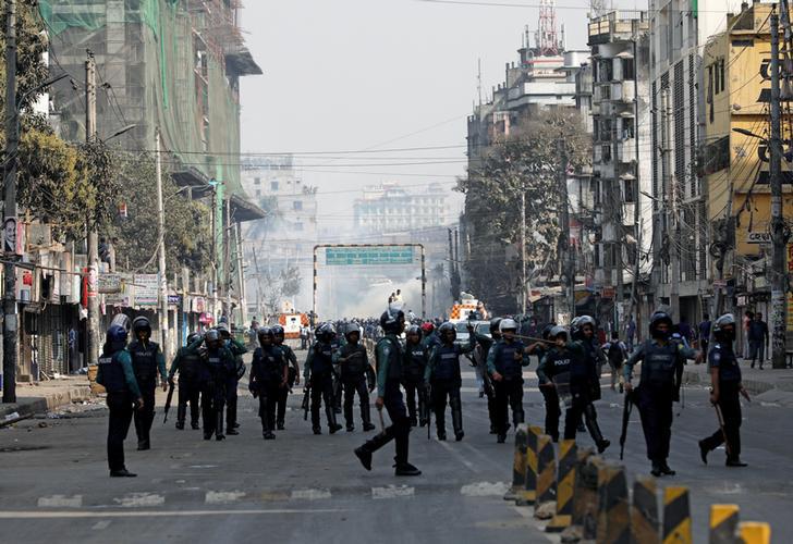 Tear gas is seen while police takes their position in the street Dhaka, Bangladesh, February 8, 2018. REUTERS/Mohammad Ponir Hossain