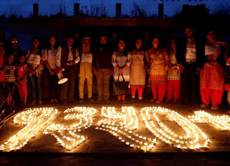 Activists observe a minute of silence in memory of the people who disappeared during the decade-long armed Maoist insurgency against the now-toppled monarchy to observe the International Day of the Disappeared in Kathmandu, Nepal August 30, 2017.