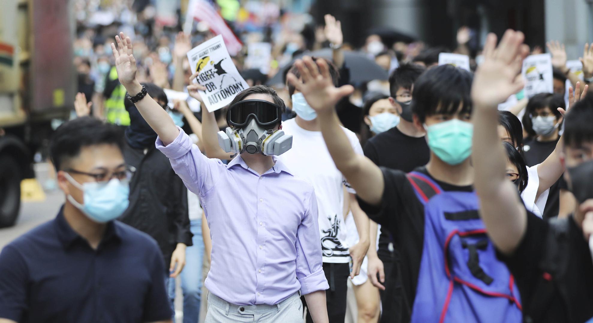 People protest the enactment of the anti-mask law in Hong Kong, October 4, 2019.