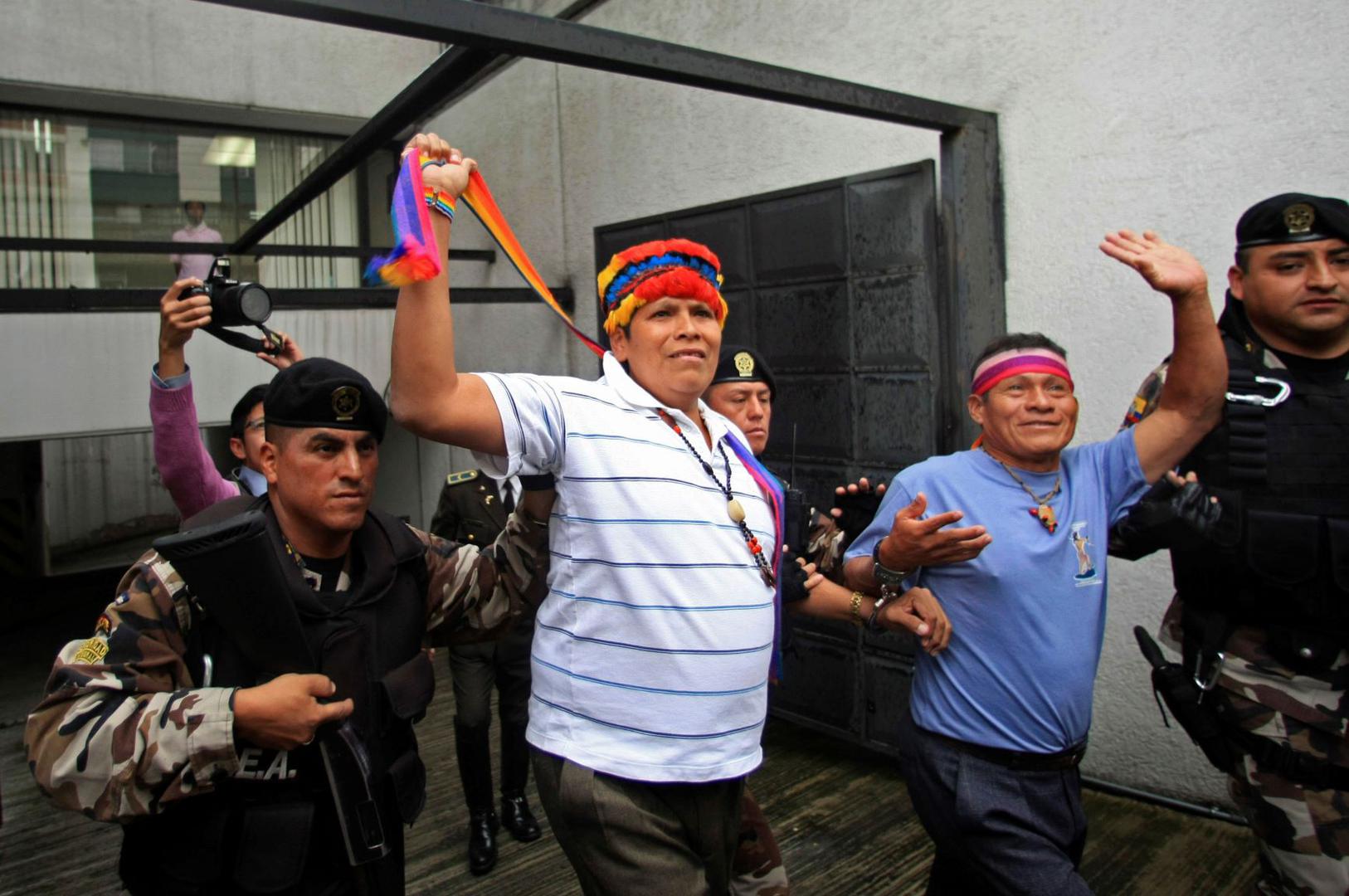 Pepe Acacho, second from left, leaves a courtroom in Quito, Ecuador, on February 8, 2011, after a judge granted his habeas corpus petition. © 2011 AP Photo/Dolores Ochoa