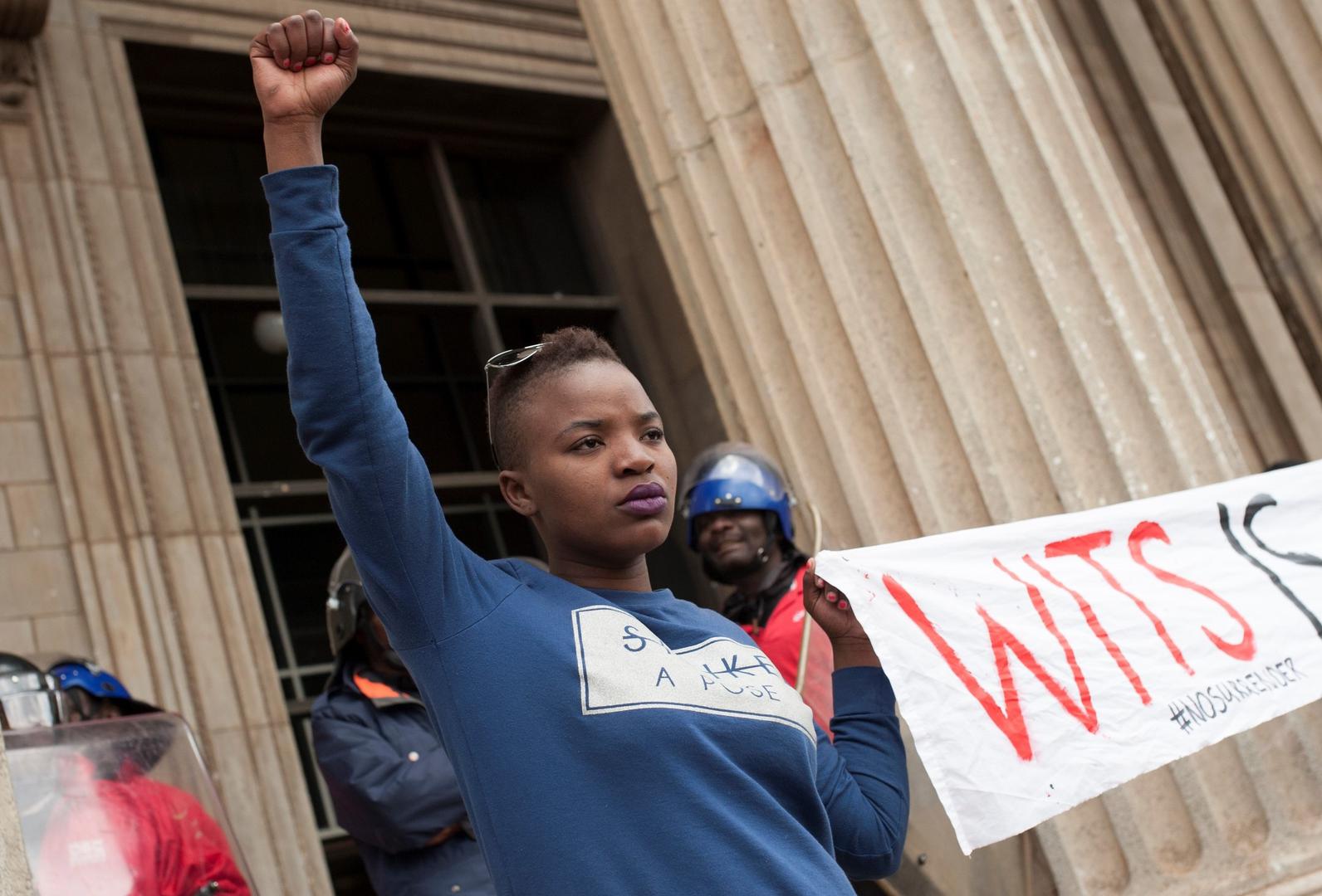 Students in front of Wits great hall protesting against the militarized securities in Wits, from the film Everything Must Fall