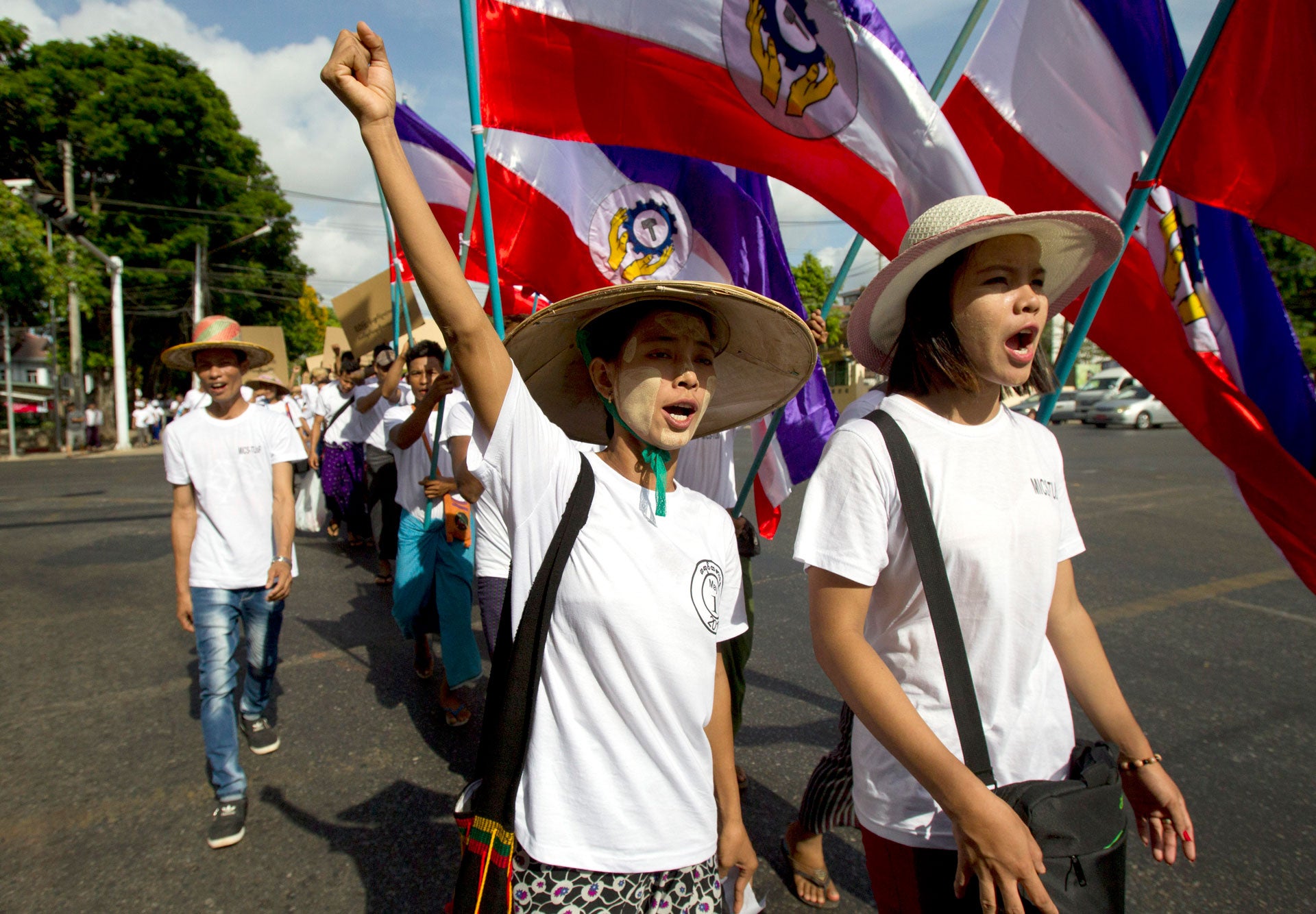 Workers shout slogans during a May Day march in Yangon, Myanmar, May 1, 2019.