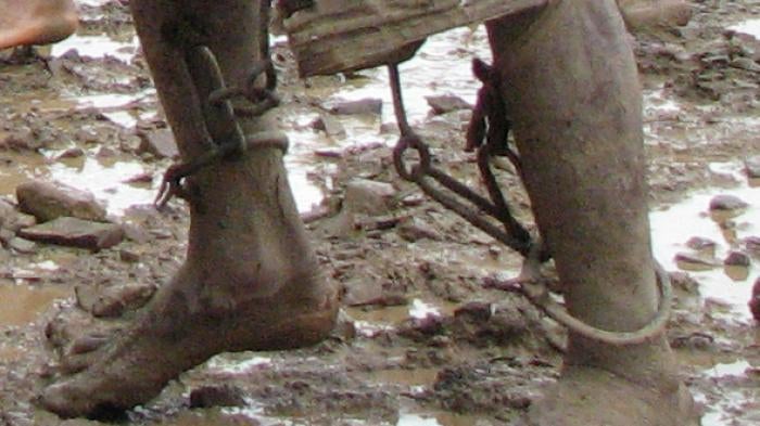 Chin prisoner forced to construct a road in northern Chin State, Burma, June 2007.