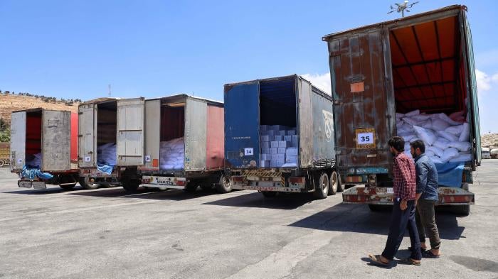 UN humanitarian aid trucks enter northwest Syria through the Bab al-Hawa border crossing with Turkey on June 1, 2021