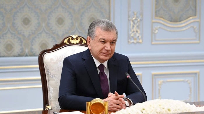 Uzbek President Shavkat Mirziyoyev receives Iranian Foreign Minister Mohammad Javad Zarif (not pictured) in Tashkent.