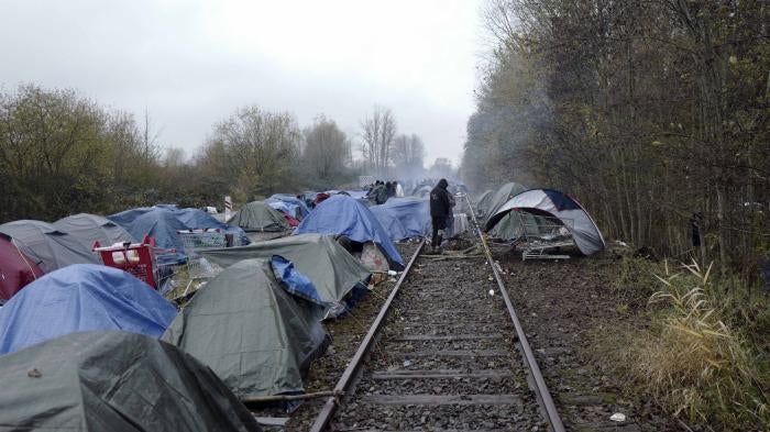 A migrants' makeshift camp in Calais, northern France, Saturday, Nov. 27, 2021. At the makeshift camps outside Calais, migrants wait for a chance to attempt crossing the English Channel despite the tragic deaths that have occurred during such attempts.