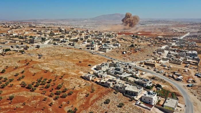 Smoke billows from Russian airstrikes near Syria's Bab al-Hawa (Cilvegözü) border crossing with Turkey on September 27, 2022, according to AFP correspondents and the Britain-based Syrian Observatory for Human Rights. © 2022 Omar Haj Kadour/AFP via Getty Images