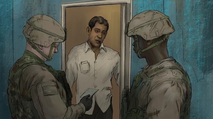 Taleb al-Majli being arrested by US troops